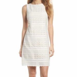 Eliza J Laser Cut Sheath Cream over tan Dress